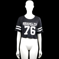 Boohoo - T-shirt - Black & White - Size 34 - Black short-sleeve top with a round neck and a straight hem. Features white text and a large number graphic on the front, plus two white stripes on each sleeve.
