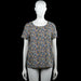 Vero Moda - T-shirt - Multicolored - Size L - Multicolored floral top with a scoop neckline and short sleeves. Straight hem and plain sleeve cuffs.