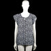 Zabaione - Blouse - Black & Light Blue - Size XL - Black and light blue floral top with a round neckline and short sleeves. Features a keyhole opening with ties at the front and an elastic hem.