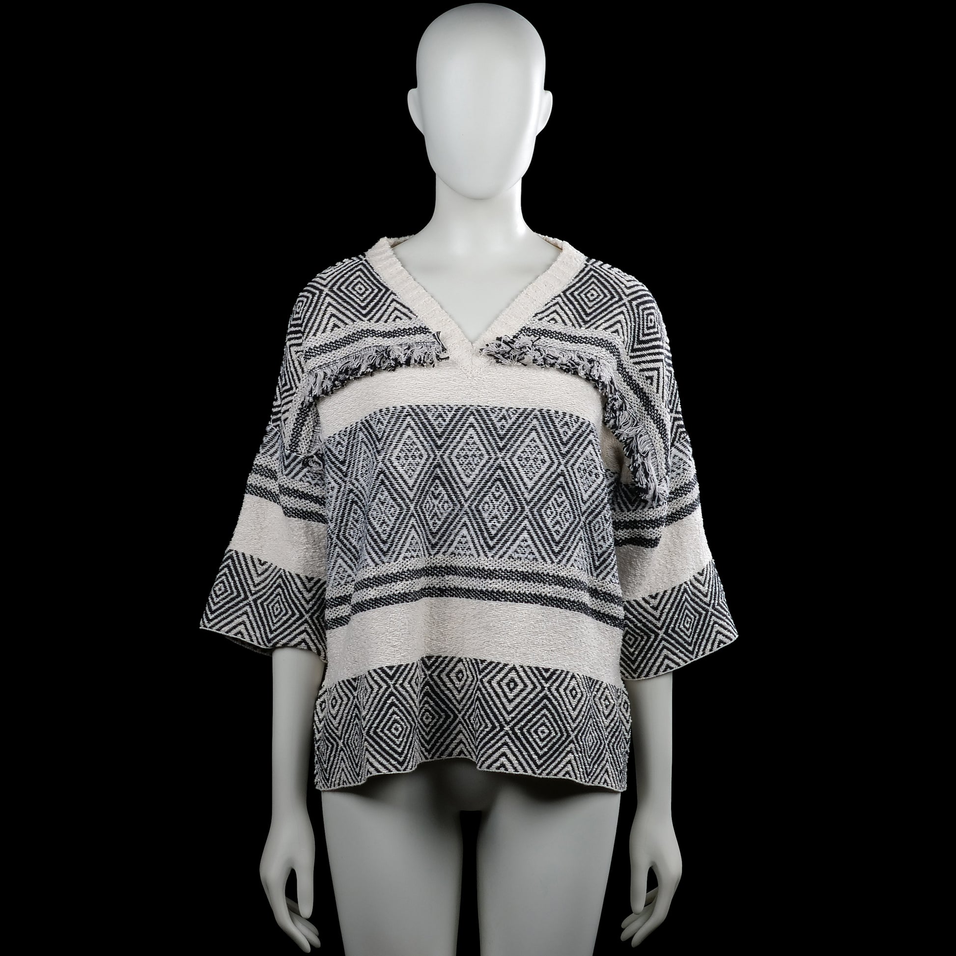 Sweater - Ivory & Black - Size L - Ivory and black patterned top with a V-neck and three-quarter sleeves. Features a straight hem and decorative fringe trim across the upper chest and back.