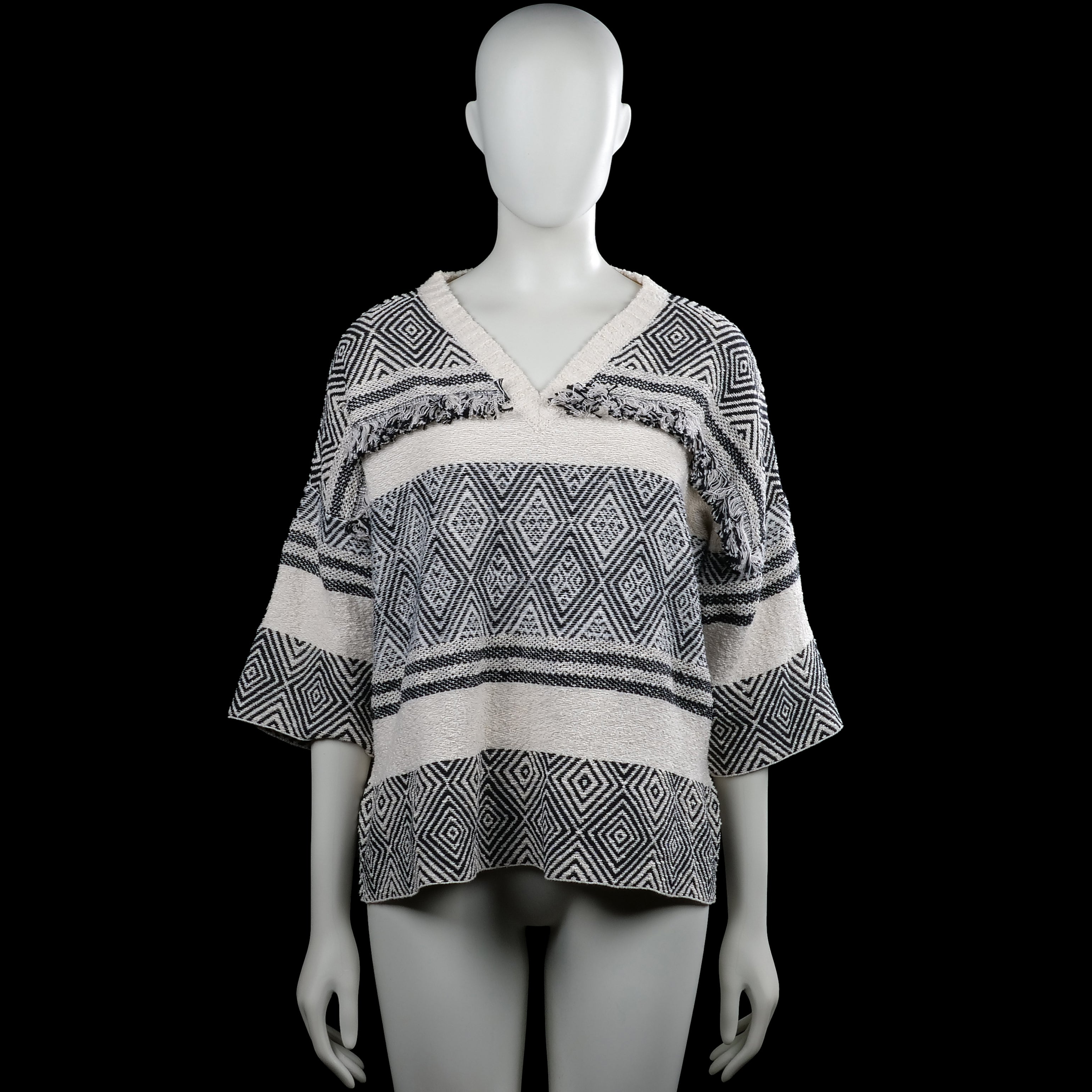 Sweater - Ivory & Black - Size L - Ivory and black patterned top with a V-neck and three-quarter sleeves. Features a straight hem and decorative fringe trim across the upper chest and back.