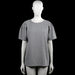Tunic - Gray - Size M - Gray solid top with a round neckline and short sleeves with pleated shoulders. Straight hem and a short back zipper closure at the neckline.
