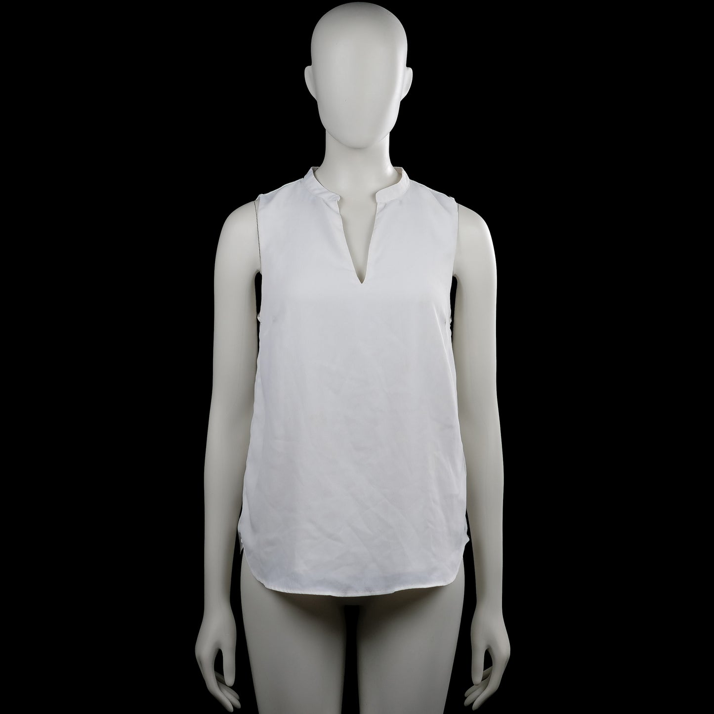 H&M - Blouse - White - Size 34 - White solid sleeveless top with a split V-neckline. Curved hem with side slits.