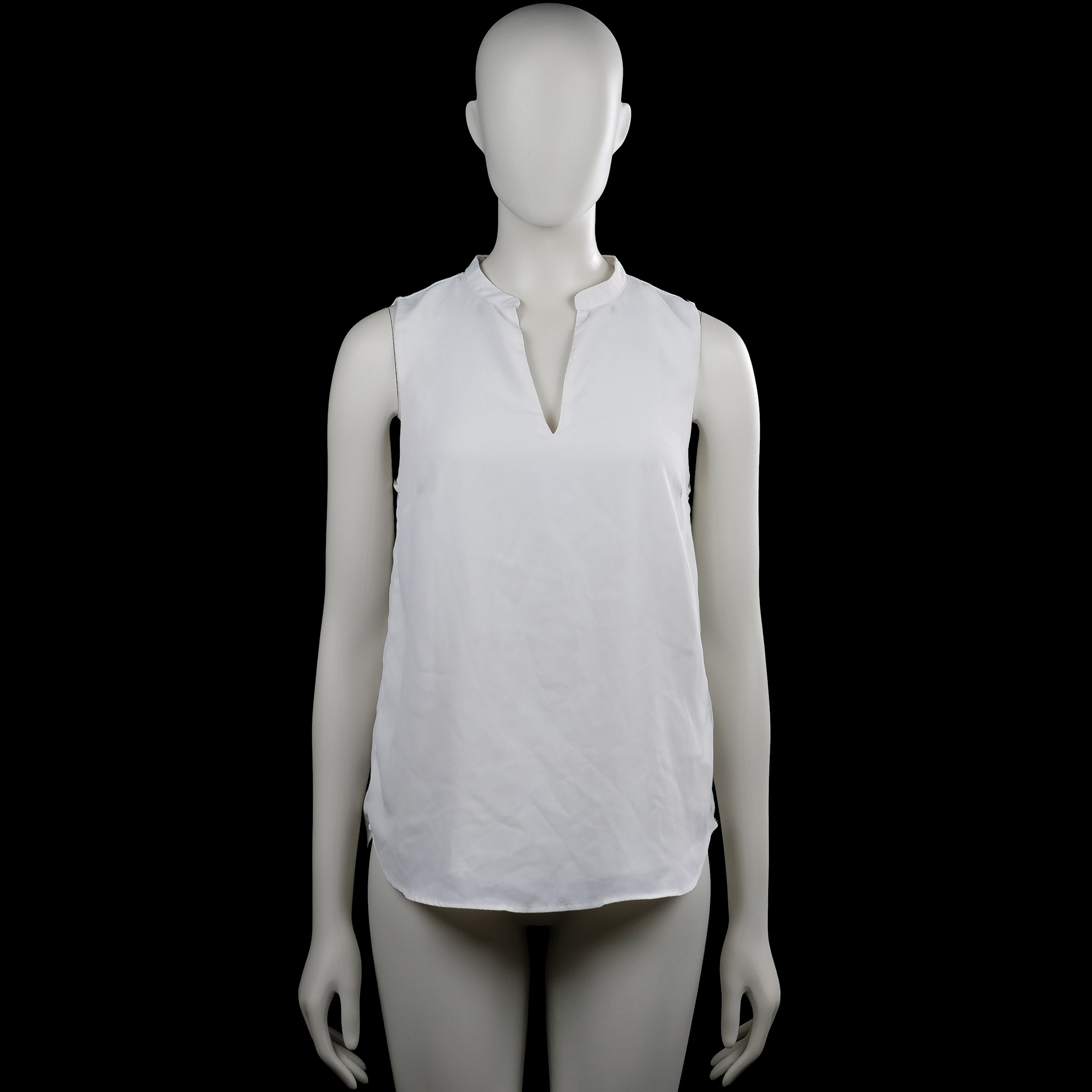 H&M - Blouse - White - Size 34 - White solid sleeveless top with a split V-neckline. Curved hem with side slits.