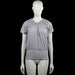 T-shirt - Light Gray - Size L - Light gray solid top with a gathered scoop neckline and short sleeves. Elastic hem and plain sleeve cuffs.