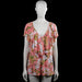 Tunic - Pink & White - Size XL - Pink and white floral top with a V-neckline and layered ruffle detail at the front. Features short flutter sleeves with plain cuffs and a straight hem.