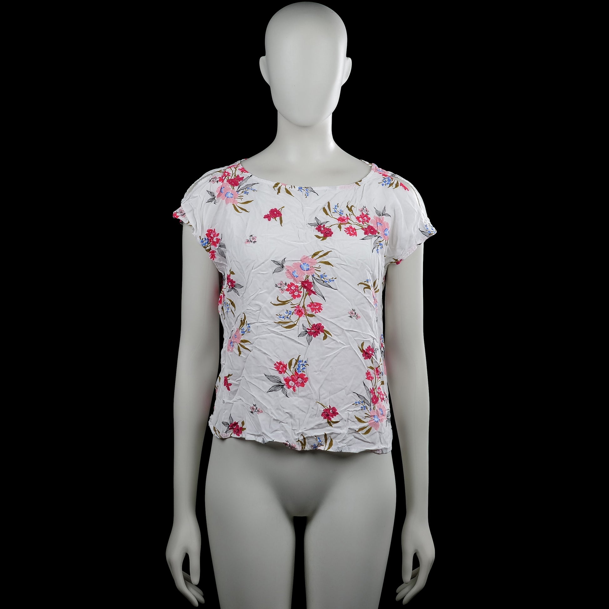 S.oliwen - T-shirt - White & Pink - Size 36 - White top with a floral pattern in pink, blue, and green, featuring a wide boat neckline and short sleeves. Straight hem with a back cutout and crisscross strap detail.