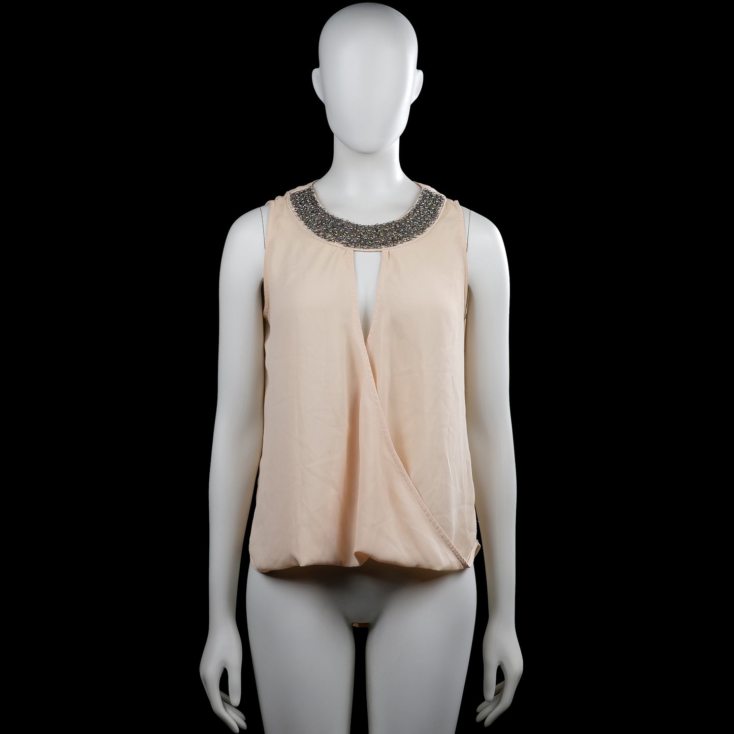 M&g - Blouse - Beige - Size S, M - Beige solid sleeveless top with a round neckline featuring beaded embellishment. Overlap front with an open slit detail and a high-low hem.