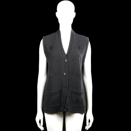 Doga - Suit vest - Black - Size M - Black sleeveless vest with a V-neck and button-front closure. Features a textured diamond pattern, two front patch pockets, and a straight hem.