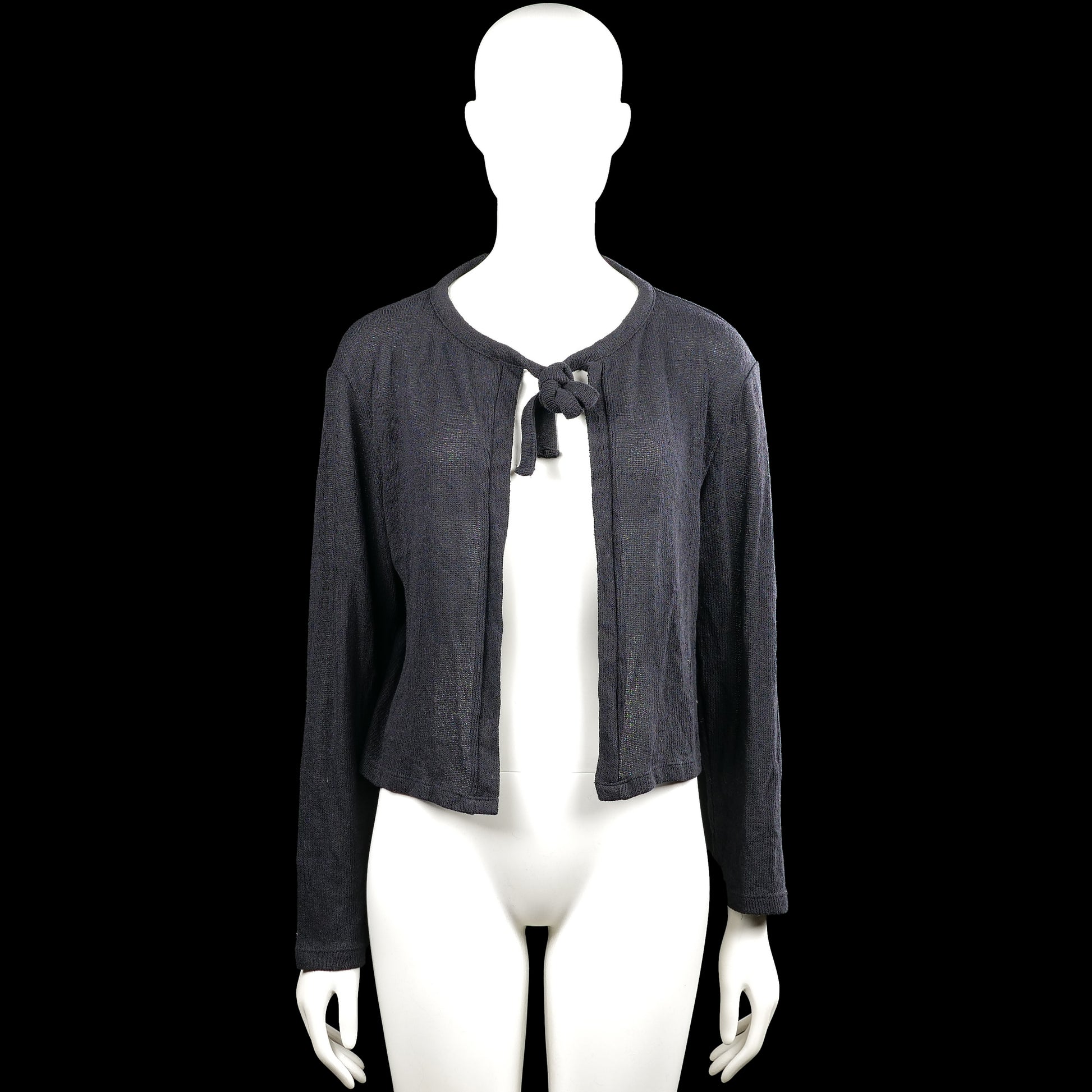 157 - Cardigan - Charcoal - Size S - Charcoal solid open-front cardigan with a round neckline and a tied bow closure at the chest. Long sleeves with plain cuffs and a straight hem.