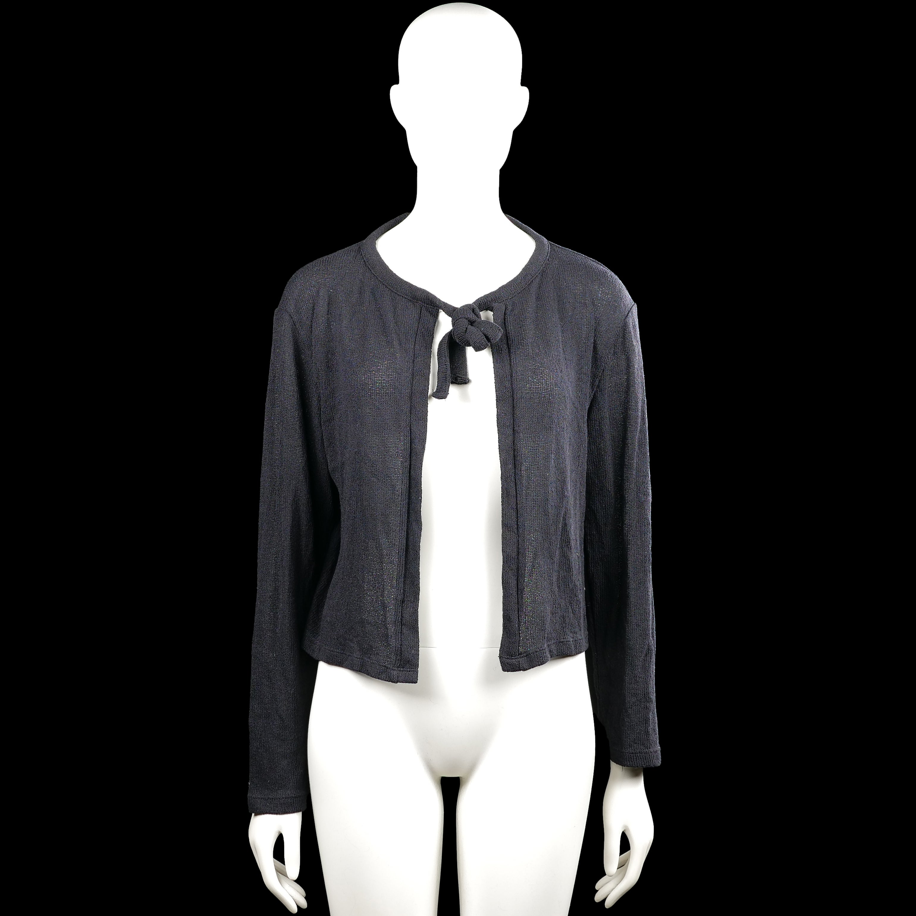 157 - Cardigan - Charcoal - Size S - Charcoal solid open-front cardigan with a round neckline and a tied bow closure at the chest. Long sleeves with plain cuffs and a straight hem.