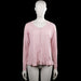 Haraya - Cardigan - Pink - Size M - Pink solid cardigan with a round neckline and a button-down front. Features long sleeves with ribbed cuffs and a ruffle hem.