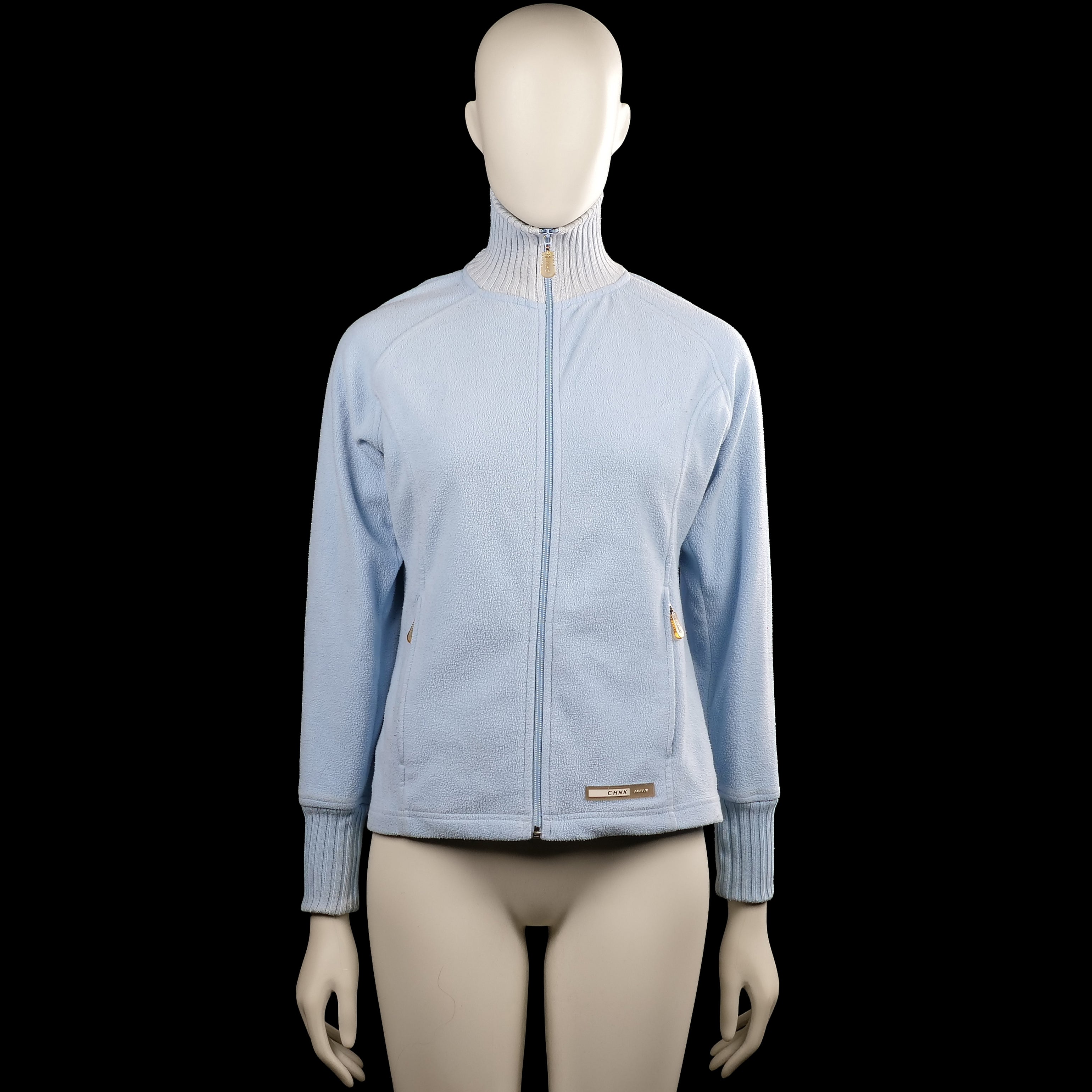 Chnk - Fleece jacket - Light Blue & Light Gray - Size 36 - Light blue solid zip-up top with a high ribbed collar and long sleeves. Features ribbed cuffs, a straight hem, and zip pockets at the sides.