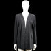Secenek - Cardigan - Black - Size L - Black solid long-sleeve open-front cardigan with a V-neck opening and floral embroidery trim along the front edges. Straight hem and plain cuffs.