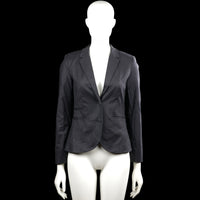Vacknox - Blazer - Black - Size 32 - Black solid blazer with a V-neck opening and lapel collar, featuring a two-button front closure. Long sleeves have buttoned cuffs and the front has flap pockets with a curved hem.