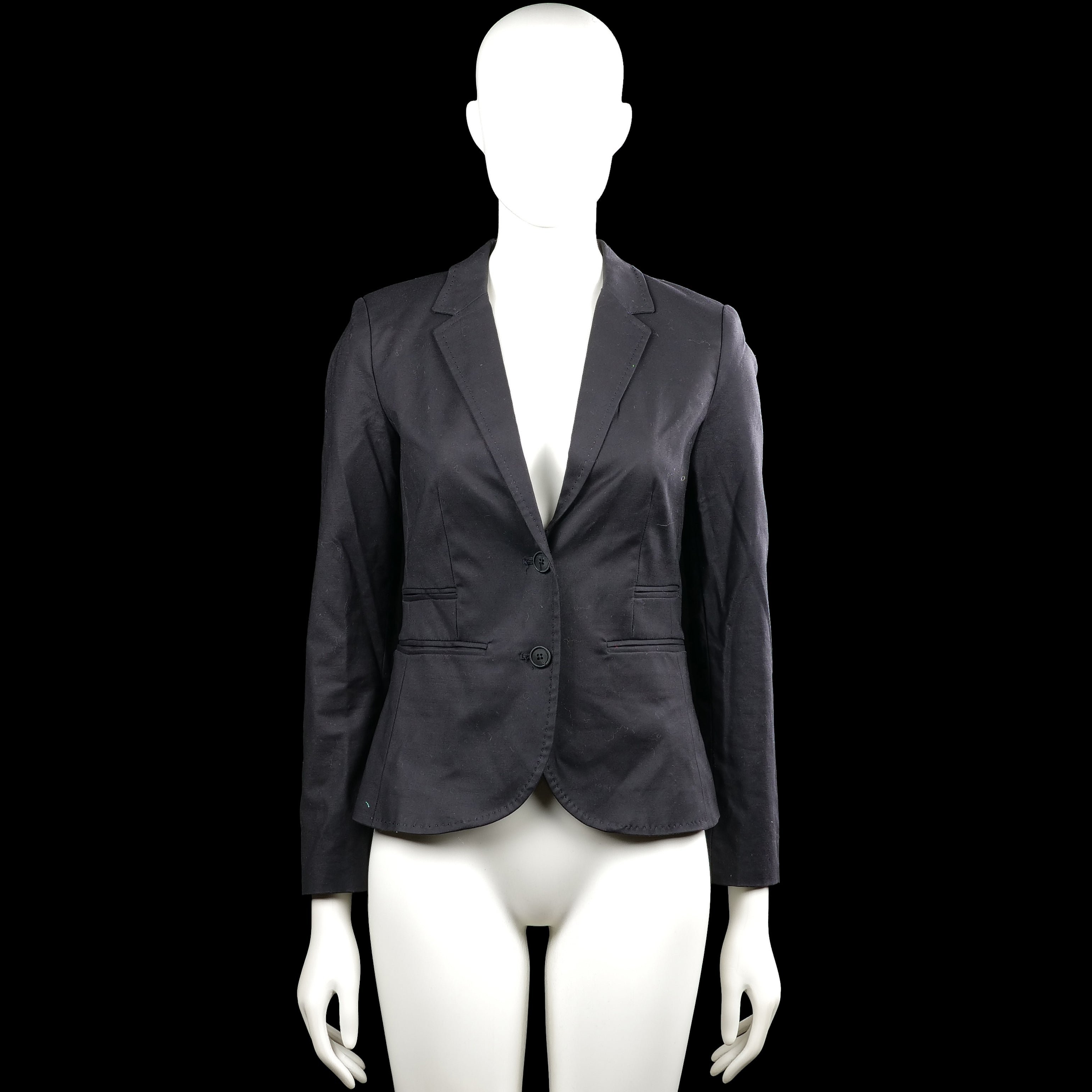 Vacknox - Blazer - Black - Size 32 - Black solid blazer with a V-neck opening and lapel collar, featuring a two-button front closure. Long sleeves have buttoned cuffs and the front has flap pockets with a curved hem.
