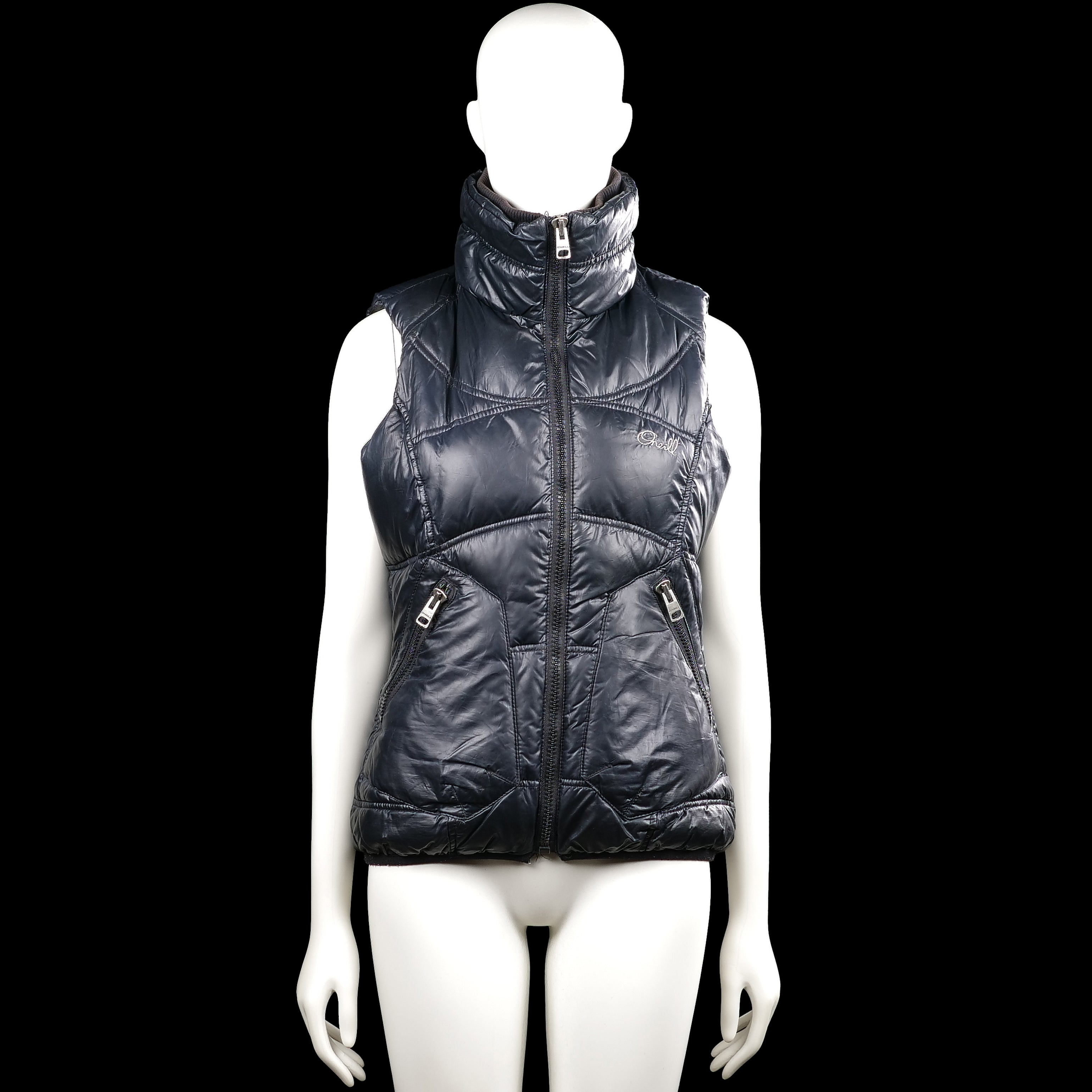 O'neill - Padded vest - Navy - Size M - Navy solid sleeveless quilted vest with a high neck and full-length front zipper closure. Features two zip pockets at the front and a straight hem.