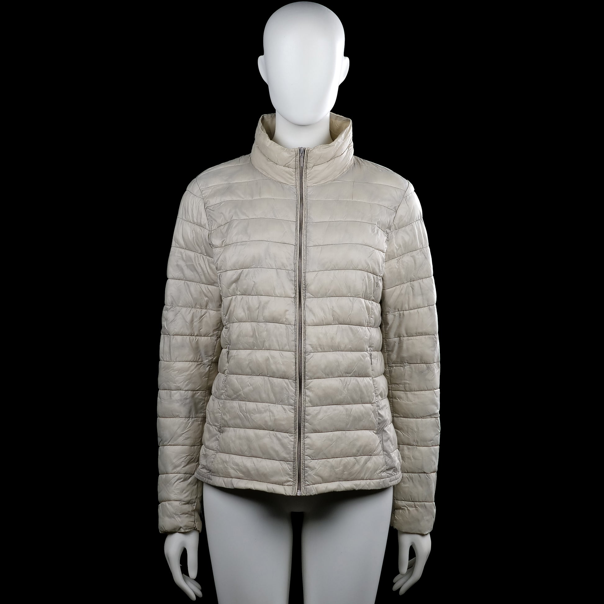 America today - Padded jacket - Beige - Size L - Beige solid quilted jacket with a high neck and a full-length front zip closure. Long sleeves with plain cuffs and a straight hem.