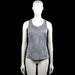 Nike dri-fit - Tank top - White & Black - Size S - Sleeveless top in a black and white all-over print with a scoop neckline. Features a racerback and a straight hem.