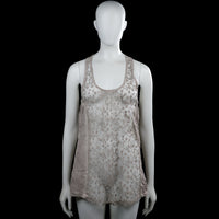 Tank top - Beige & Ivory - Size M - Sleeveless ivory and beige top with a scoop neckline and a racerback. Features a repeating floral pattern and a curved hem.