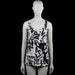 Tank top - White & Black - Size M - White sleeveless top with a scoop neckline and an all-over black graphic text print. Straight hem and plain armholes with no visible closures.