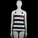 Åhus beach handboll - Tank top - White & Black - Size 36, 38 - White and black striped sleeveless tank top with a scoop neckline and plain armholes. Features a straight hem and a small graphic on the chest.