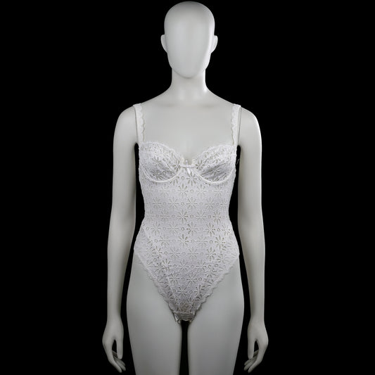 Chantelle - Bodysuit - White - Size XS - White sleeveless lace bodysuit with a scoop neckline and shoulder straps. Features floral lace patterning with a scalloped asymmetrical hem and a small bow at the front.