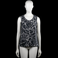 City life - Tank top - Black & White - Size L - Black and white sleeveless top with an abstract print and a scoop neckline. Features an elastic hem and a short front placket with buttons.