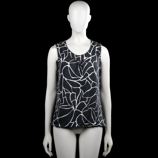 City life - Tank top - Black & White - Size L - Black and white sleeveless top with an abstract print and a scoop neckline. Features an elastic hem and a short front placket with buttons.