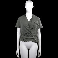 Even & do - Blouse - Olive - Size S - Olive solid top with a V-neck wrap front, short sleeves with button tabs, and a ruffle hem. Features a chest patch pocket and a self-tie belt at the waist.