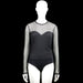 Amisu - Bodysuit - Black & Light Gray - Size M - Black and light gray dotted bodysuit with a round neck and long sleeves. Features a back keyhole opening with a button closure, plain cuffs, and a straight hem.