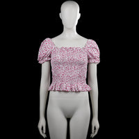 Uniq young - Blouse - White & Pink - Size 170 - White top with a pink floral pattern and a squared neckline. Features short puff sleeves with elastic cuffs, a smocked bodice, and a ruffled hem.