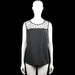 Shein - Tank top - Black & White - Size 1XL - Sleeveless top with a black body and a white upper yoke with black polka dots. Scoop neckline with plain trim and a straight hem.