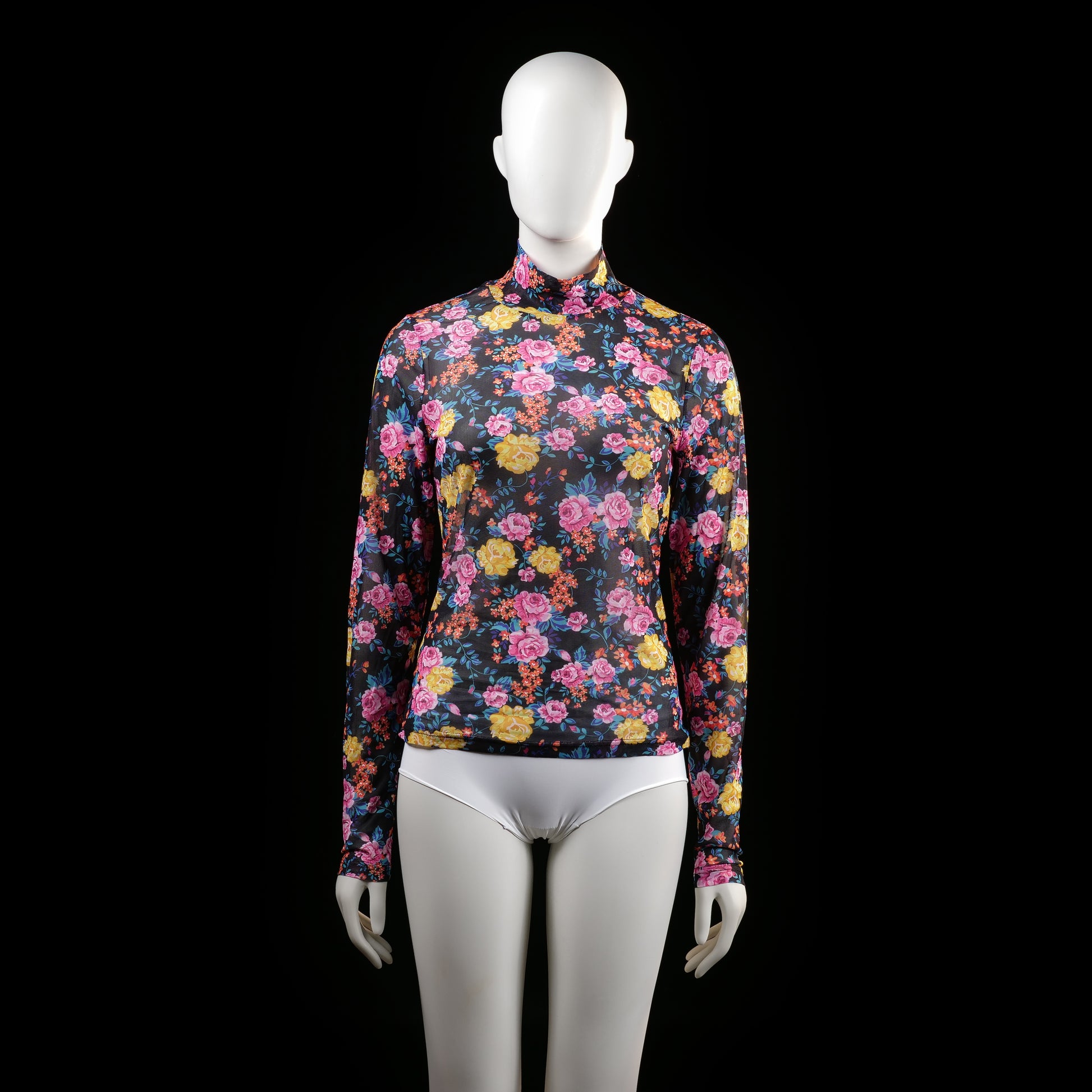 Istay - Blouse - Multicolored - Size S - Fitted long sleeve top with a mock neck and all-over vibrant floral print on a dark background. The garment is semi-sheer and features a high neckline with no visible closures.