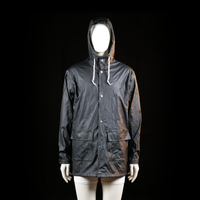 Lager 157 - Rain jacket - Black - Size S, M - Long black hooded jacket with a shiny, water-repellent surface and white drawstrings at the hood. Features front snap-button closure, two large flap pockets, and a reflective strip on the lower back hem.