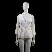 Vintage Dressing - Blouse - Ivory - Size M - Lace blouse with a deep V-neckline, flared 3/4 sleeves, and scalloped hem finishes. Features a fitted waistband with circular lace detailing and a slightly flared bottom.