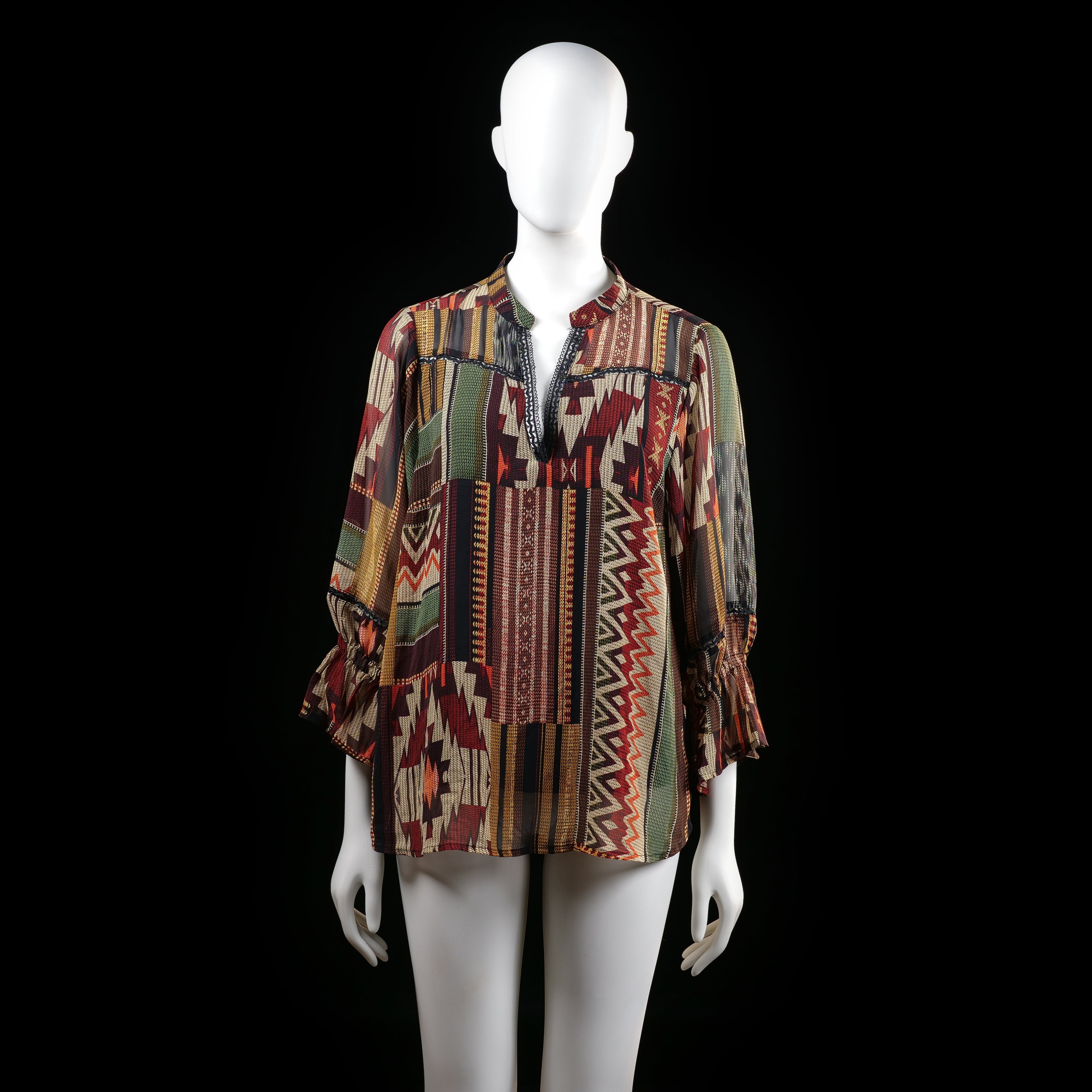 Tramontana - Blouse - Multicolored - Size 42 - Loose-fitting blouse with a multicolored geometric and tribal-inspired patchwork pattern. Features a split neckline with subtle trim detail and 3/4 sleeves with elasticated ruffle cuffs.