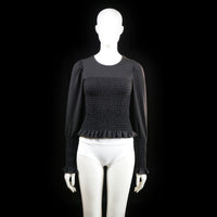 Gina Tricot - Blouse - Black - Size S - Long-sleeve top with a fully shirred bodice and sleeve cuffs, featuring a ruffled hem and sleeve ends. Rounded neckline with lightly puffed shoulders.