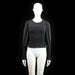 Gina Tricot - Blouse - Black - Size S - Long-sleeve top with a fully shirred bodice and sleeve cuffs, featuring a ruffled hem and sleeve ends. Rounded neckline with lightly puffed shoulders.