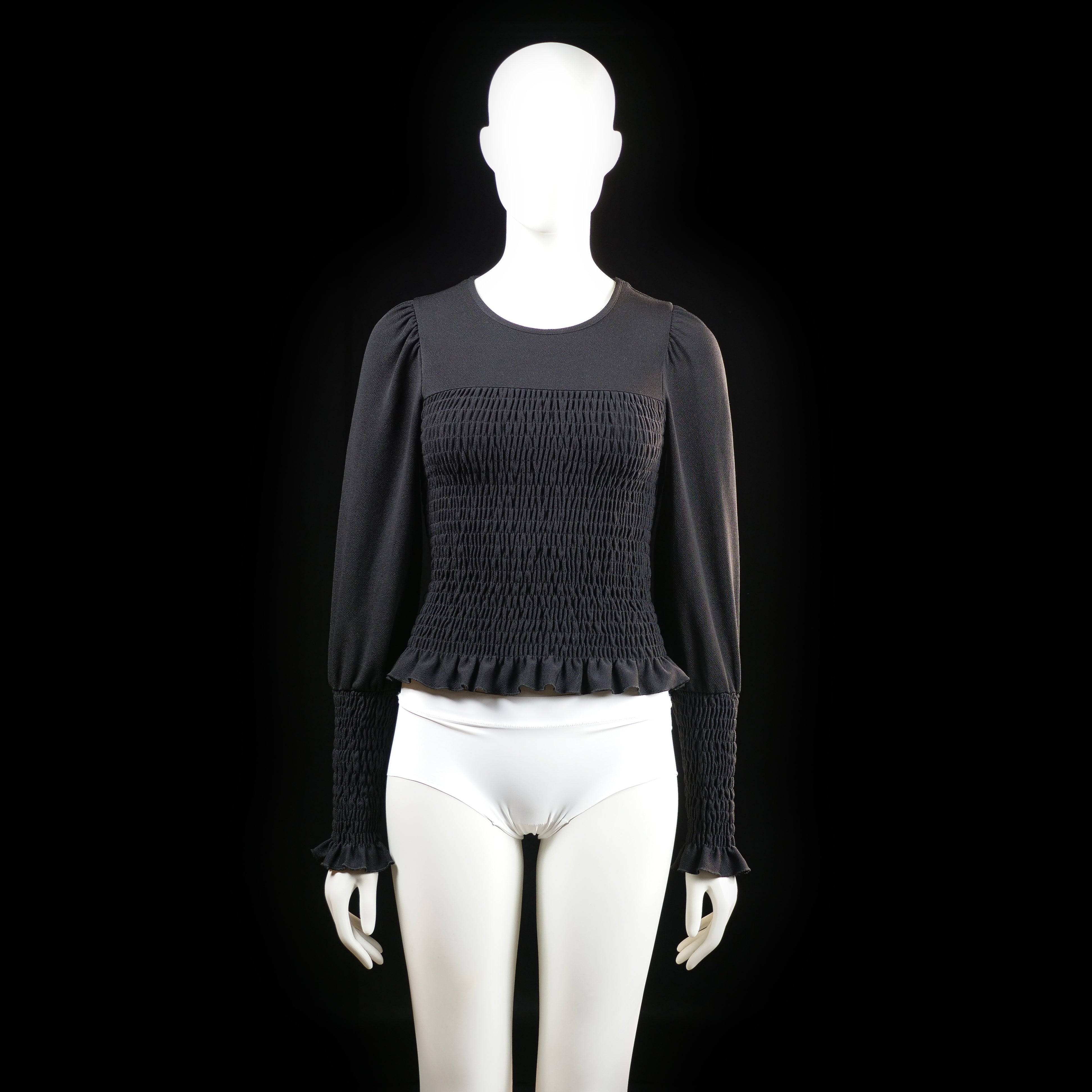 Gina Tricot - Blouse - Black - Size S - Long-sleeve top with a fully shirred bodice and sleeve cuffs, featuring a ruffled hem and sleeve ends. Rounded neckline with lightly puffed shoulders.