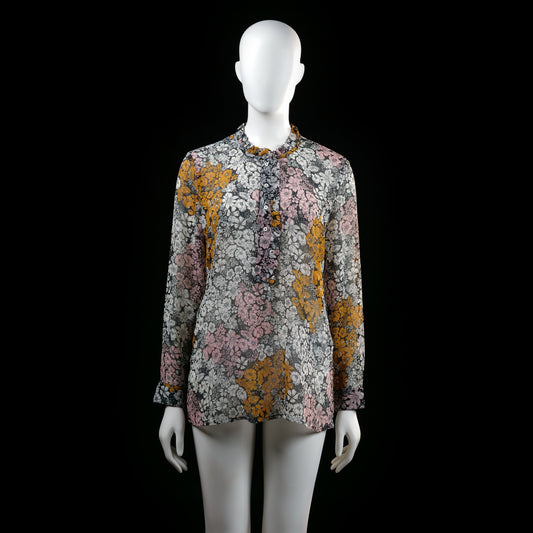 H&M - Blouse - Multicolored - Size 38 - Long-sleeve floral blouse with a ruffled high collar and front button placket. Features an all-over multicolored flower pattern in pink, mustard yellow, and various shades of gray on a light background.