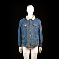 The Denim - Denim jacket - Denim Blue & Ivory - Size L - Blue denim jacket with a visible sherpa-lined collar, button-up front, and dual flap chest pockets. Vertical welt pockets and structured panel seams add definition.