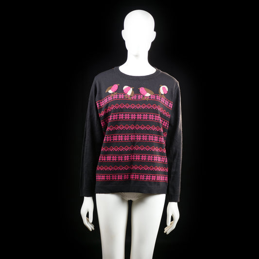 Mud Flower - Sweater - Black & Pink - Size L, XL - Black long-sleeve sweater with a repeated geometric and floral pattern in pink across the front. Features five stylized bird appliqués near the neckline.