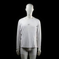 Nike - Sports top - White - Size XL - Long-sleeve athletic top with raglan sleeves and a small "RUN" graphic on the chest. Features visible stitching and a vertical reflective detail on the upper back.
