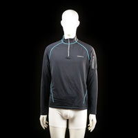 Craft - Sports top - Black & Light Blue - Size M - Long-sleeve sports top with a half-zip front, light blue contrast stitching, and a zip pocket on the upper left sleeve. High collar and fitted silhouette.