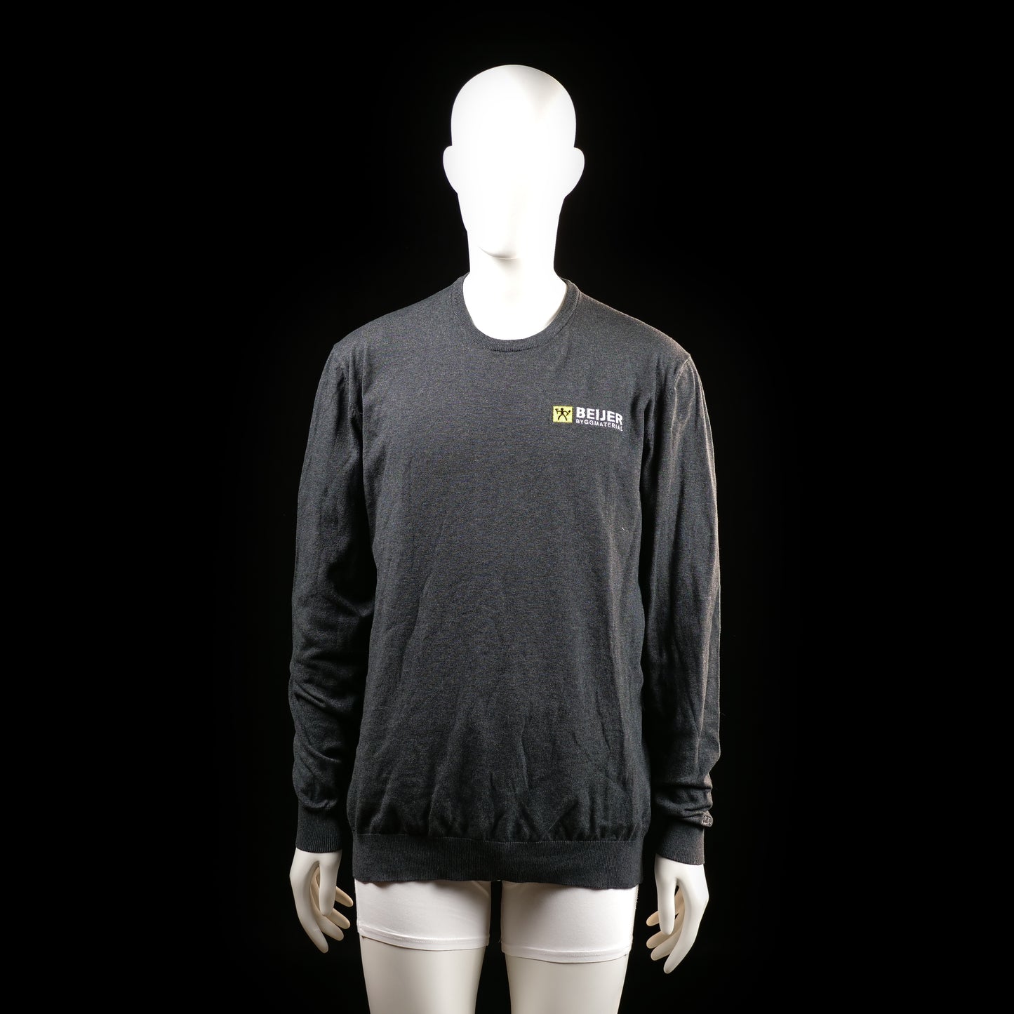Cutter & Buck - Sweatshirt - Charcoal - Size XL - Long-sleeve top featuring ribbed cuffs and hem with a small logo print on the left chest. The fabric is solid with a visible dark heathered texture.