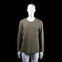 Merchant Marine - Long-sleeve top - Olive - Size M - Long-sleeve top with a round neckline and small round emblem graphic on the left chest. The hem and neckline have a raw, slightly distressed finish.