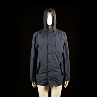 Cubus - Rain jacket - Navy - Size M - Hooded jacket with a high collar, front button placket over a zipper, vertical zip chest pocket, and two angled flap pockets with button closures. Features a longer length and drawstring details at the hood and hem.