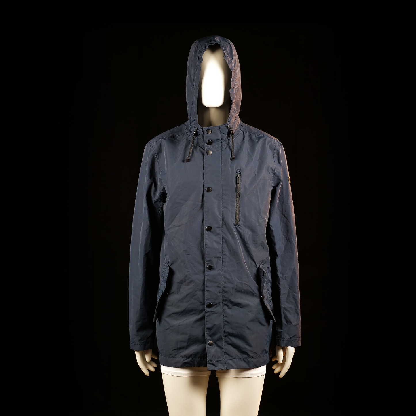 Cubus - Rain jacket - Navy - Size M - Hooded jacket with a high collar, front button placket over a zipper, vertical zip chest pocket, and two angled flap pockets with button closures. Features a longer length and drawstring details at the hood and hem.