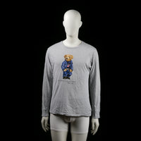 Ralph Lauren Polo - Long-sleeve top - Light Gray - Size XL - Light gray long-sleeve top with a front graphic of a bear dressed in blue clothing. Features a round neckline and plain sleeves with no additional detailing.